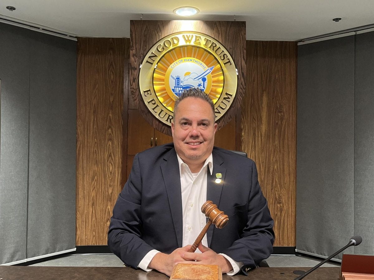 Mayor Alejandro "Alex" Vargas holds a meeting gavel in the council chambers at the Hawthorne City Hall on Wednesday, April 16. Vargas is an adjunct physics professor at El Camino College and has served as the mayor of Hawthorne since November 2015. (Sydney Sakamoto | The Union) Mayor Alejandro "Alex" Vargas holds a meeting gavel in the council chambers at the Hawthorne City Hall on Wednesday, April 16. Vargas is an adjunct physics professor at El Camino College and has served as the mayor of Hawthorne since November 2015. (Sydney Sakamoto | The Union)
