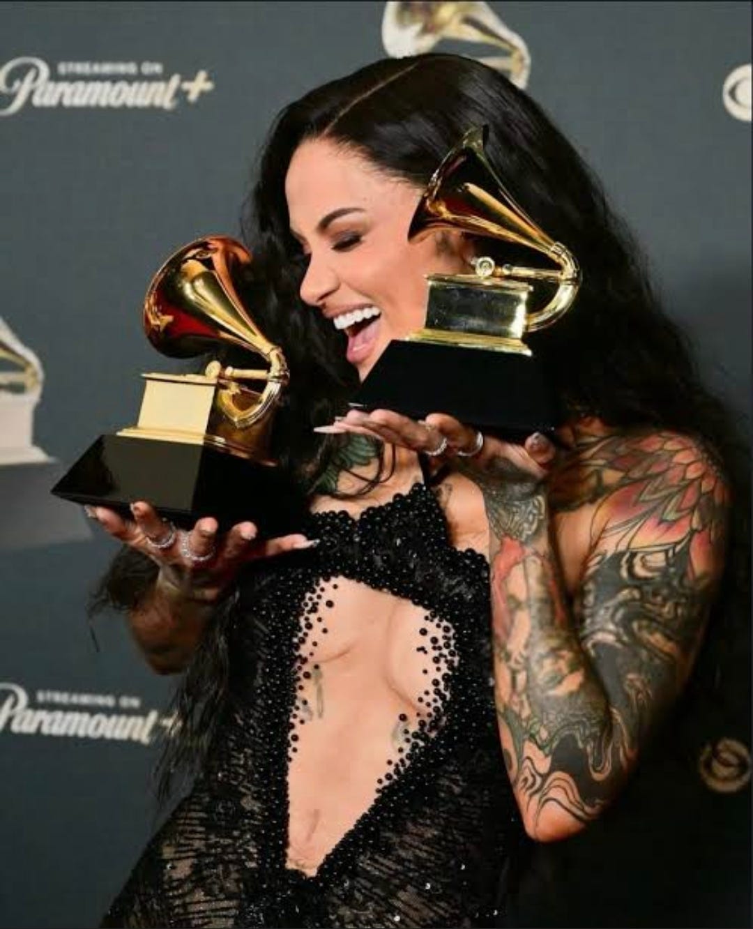 A person holding a trophy