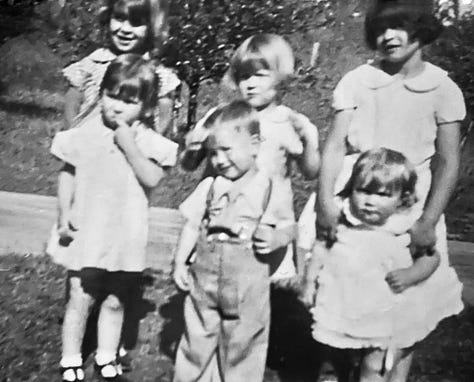 Numerous photos of Beverly Ann (Lusk) King throughout the decades with family, pets, and friends. Most are group poses for the camera with a few candid moments. All are shot in either black & white, sepia, and color.
