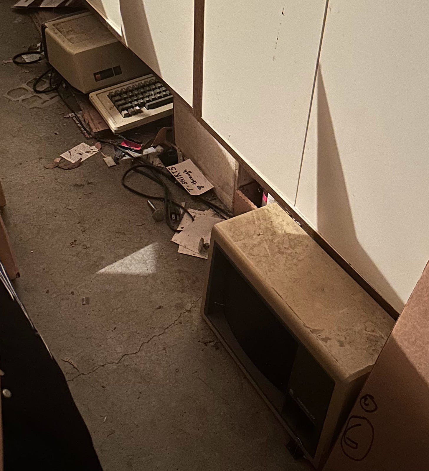 Apple /// and Monitor /// in the garage. They are caked with dirt and obviously have been neglected. The author feels bad about this.