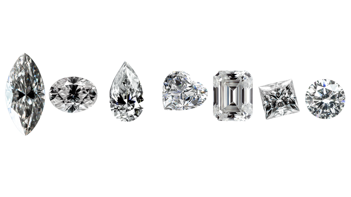 A line of diamonds in different shapes: From the start: Marquise, oval, pear, heart, emerald, princess, round A line of diamonds in different shapes: From the start: Marquise, oval, pear, heart, emerald, princess, round