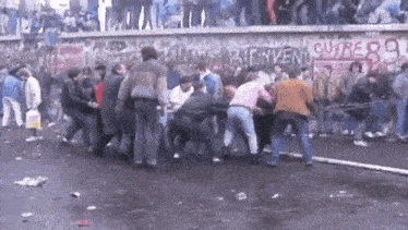 Fall Of Berlin Wall East Germany GIF - Fall Of Berlin Wall Berlin Wall East Germany GIFs