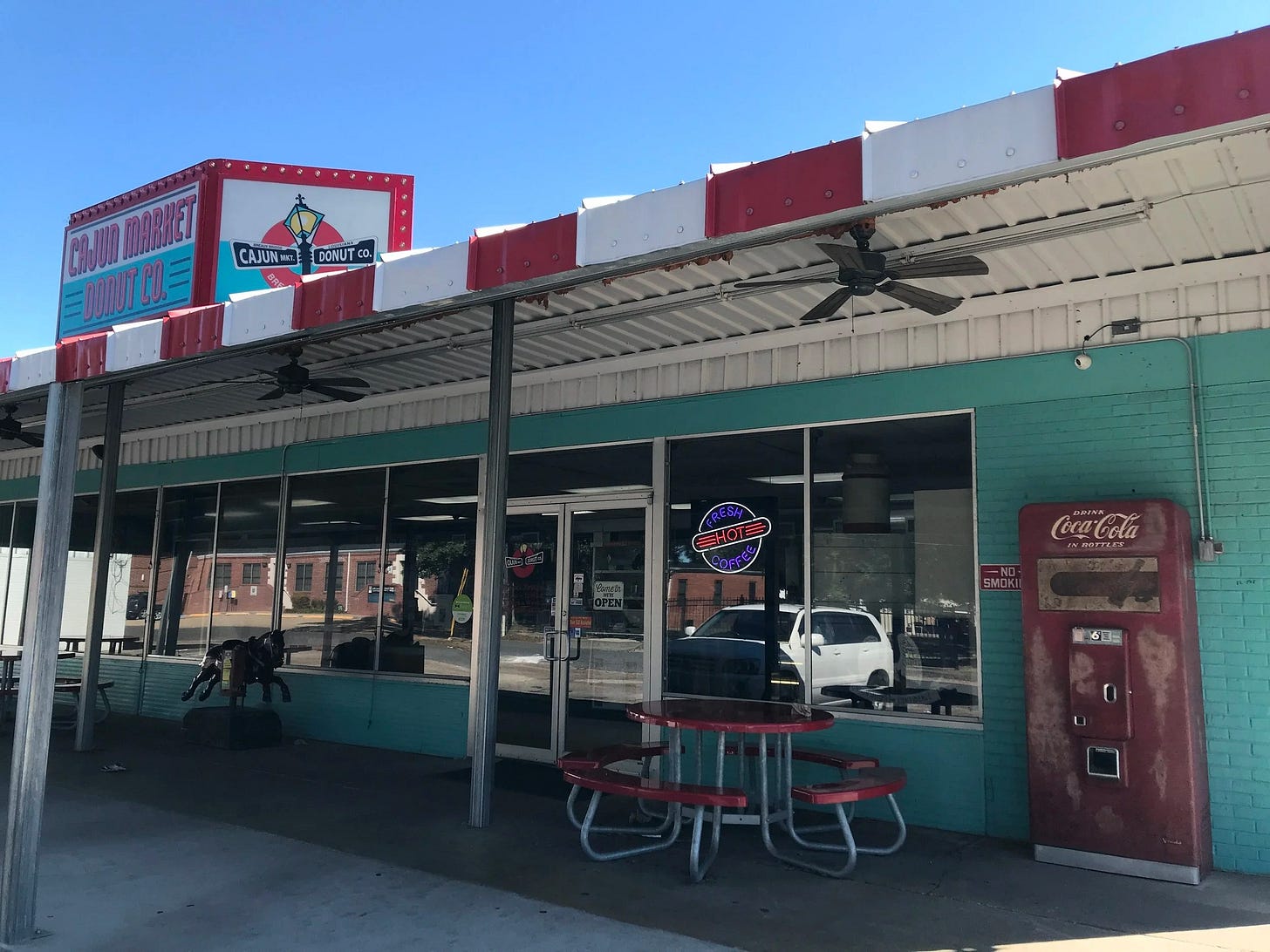  Cajun Market Donut Company in downtown Breaux Bridge, LA. Retro vibe fresh donut shop for an afternoon pick-me-up or breakfast and coffee! 