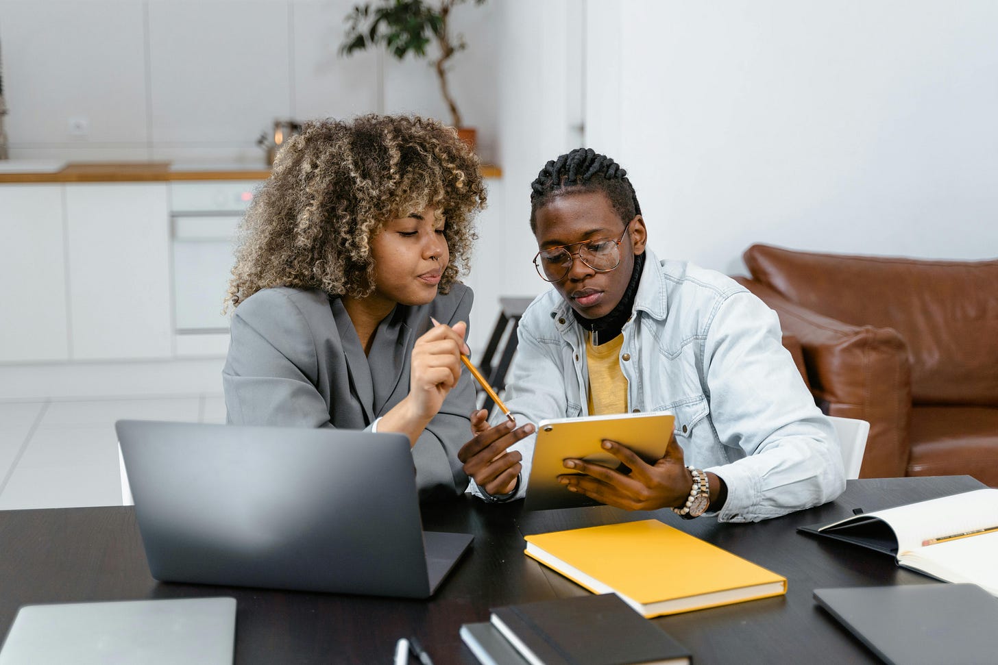 Photo by MART  PRODUCTION: https://www.pexels.com/photo/a-man-and-woman-planning-while-looking-at-the-tablet-7550402/