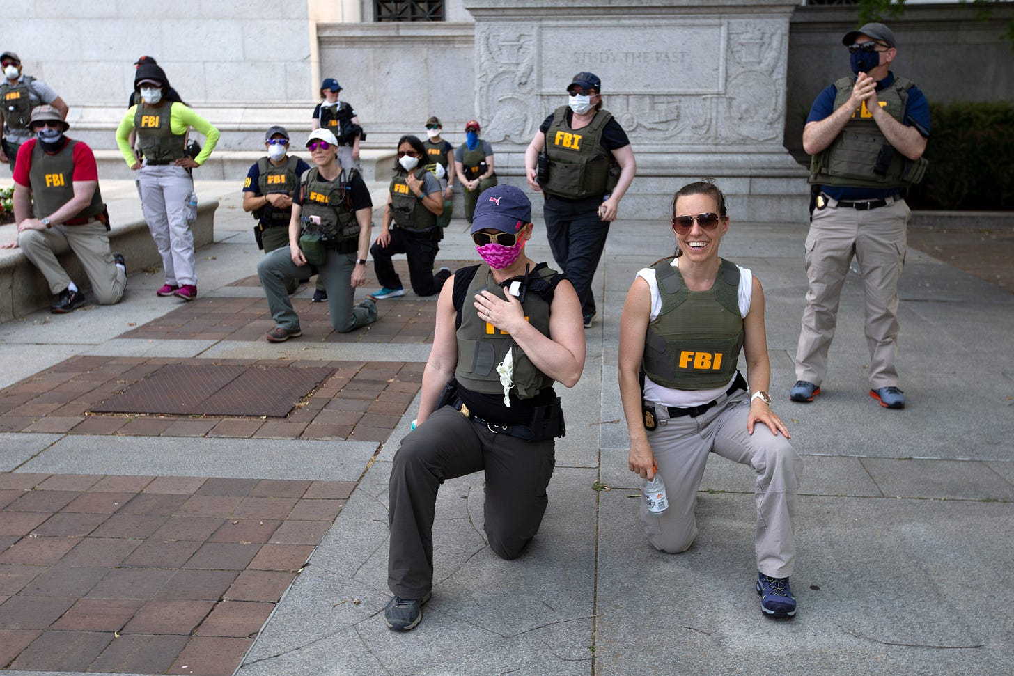 FBI insiders say agents who took a knee during BLM protests were rewarded -  Washington Times