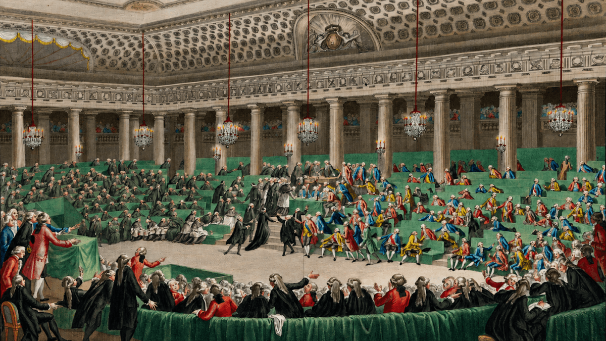 A large assembly of people in 18th-century attire gathers in an ornate hall with chandeliers, columns, and green-covered tables, engaging in discussion and debate.
