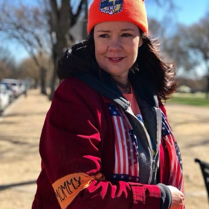 Laurie Woodward Garcia joining a march and rally for DACA and Dreamers.