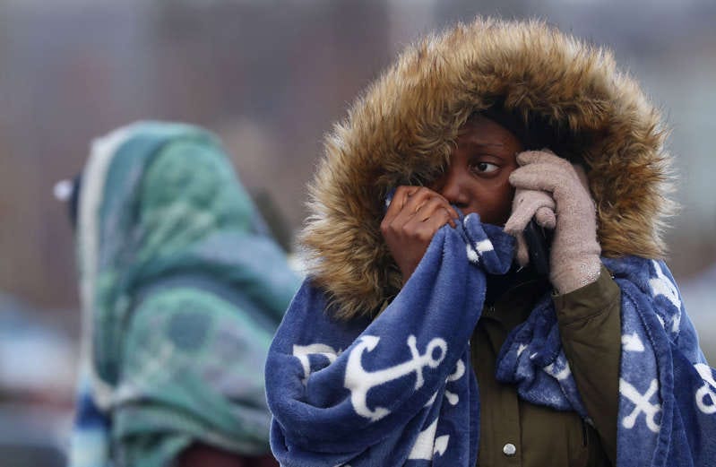 People fleeing the Russian invasion in Ukraine cross the border into Poland