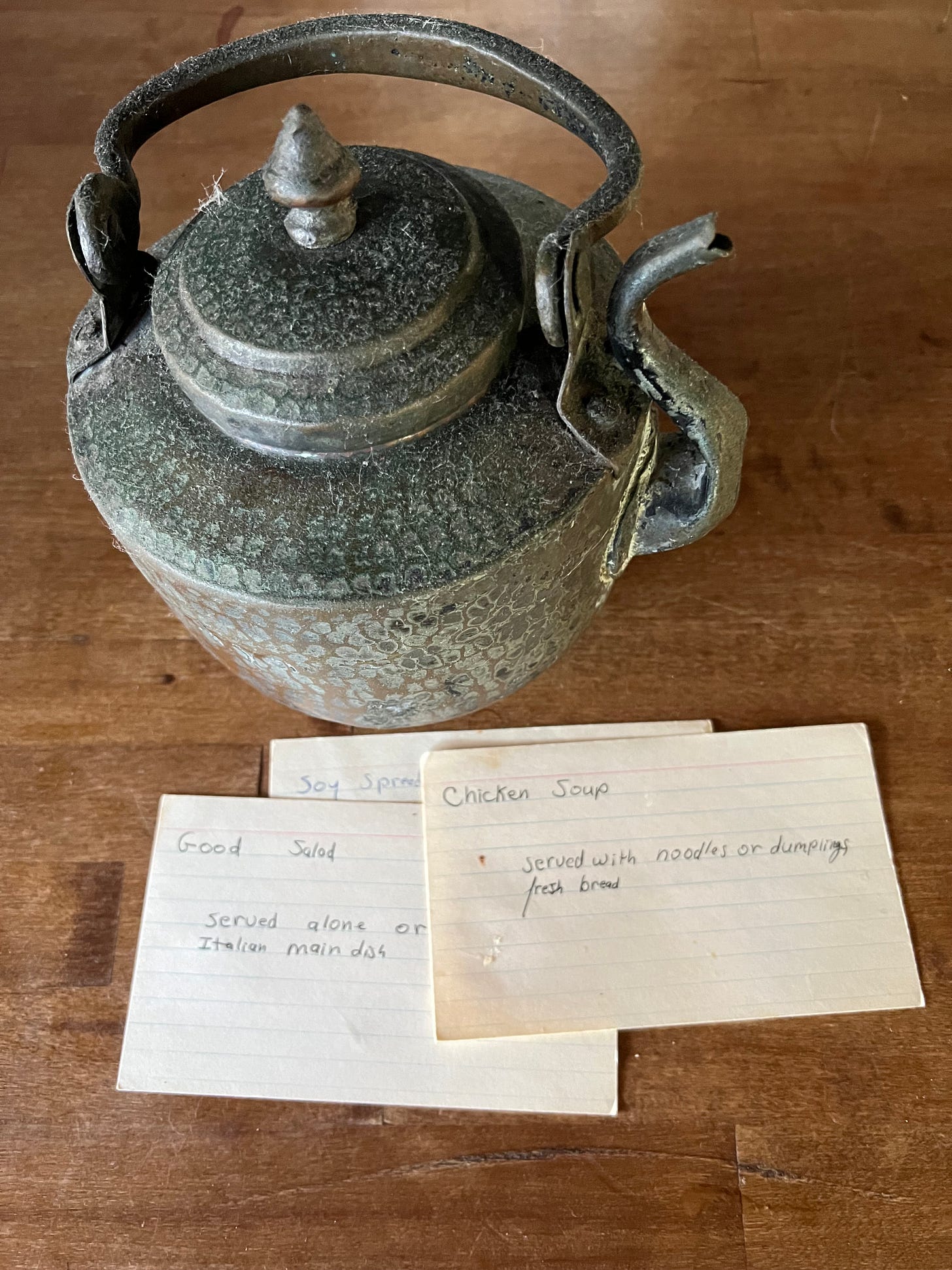 An old teapot and some recipe cards An old teapot and some recipe cards