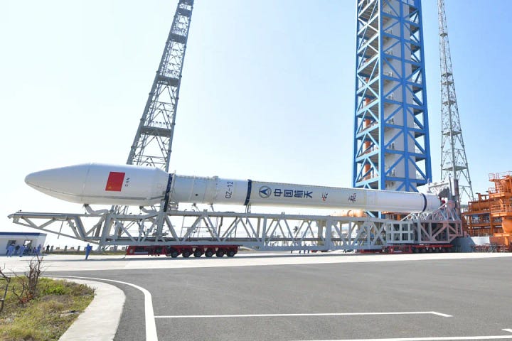 The Long March 12 Y5 vehicle heading to and arriving at Commercial Launch Pad 2.