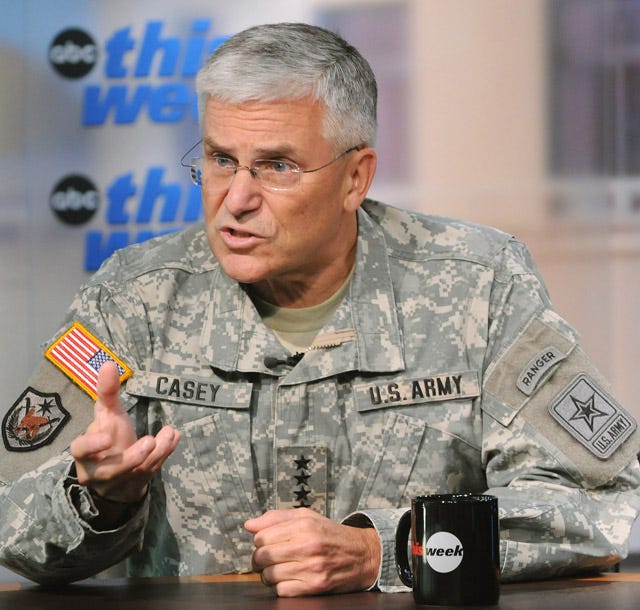 A person in military uniform talking to someone AI-generated content may be incorrect. A person in military uniform talking to someone AI-generated content may be incorrect.