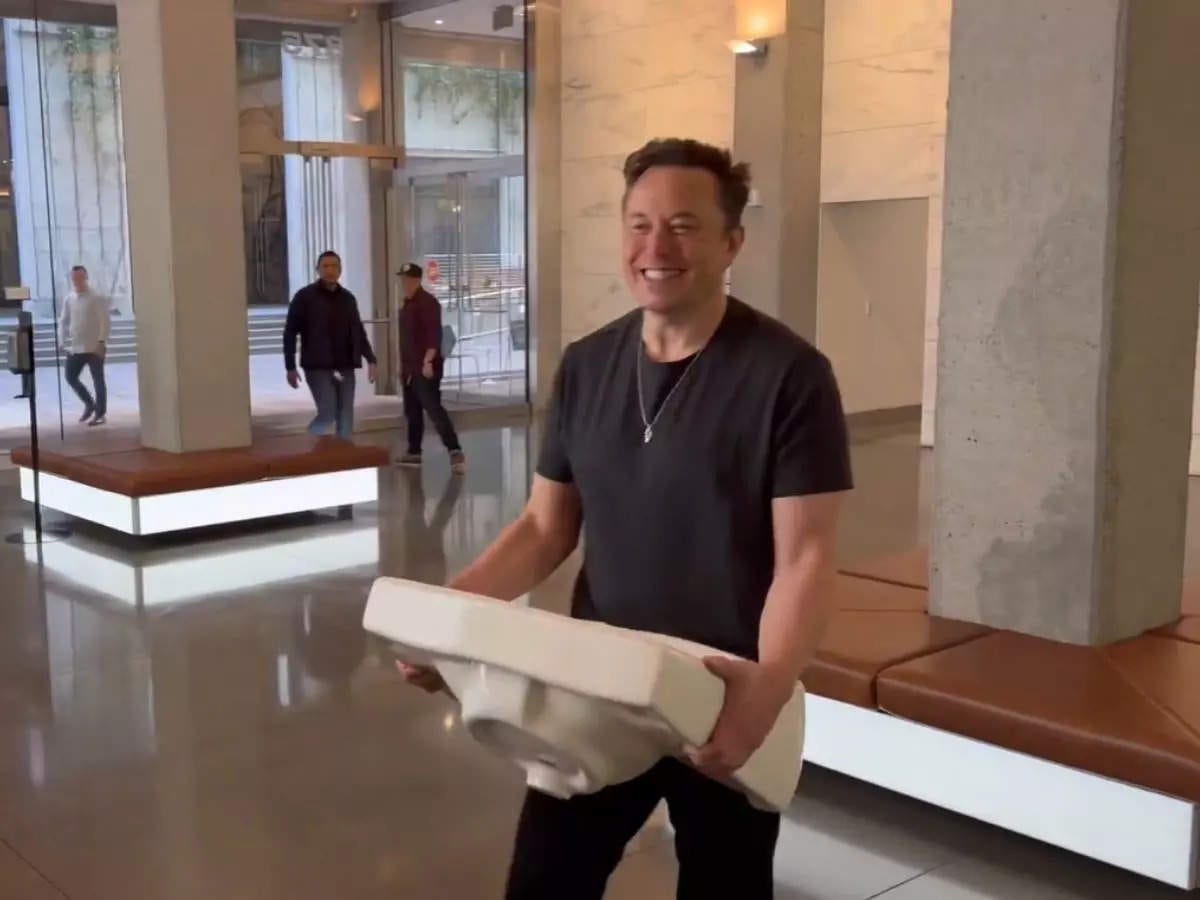 elon musk: Let that sink in! Elon Musk struts around Twitter HQ with  washbasin in hand ahead of $44bn buyout deadline - The Economic Times