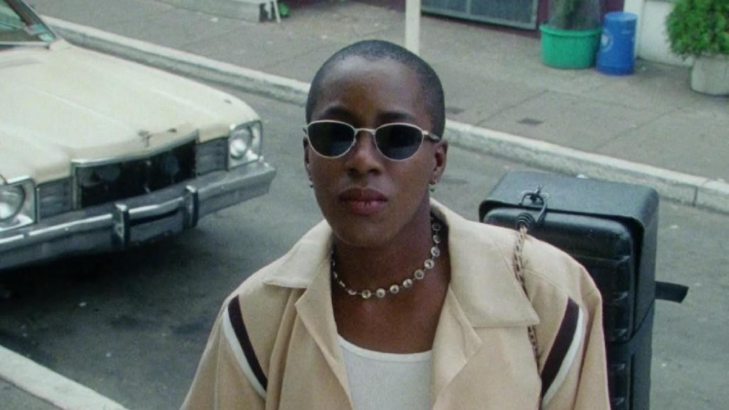 cheryl dunye wearing sunglasses in a still photo of her film "the watermelon woman"
