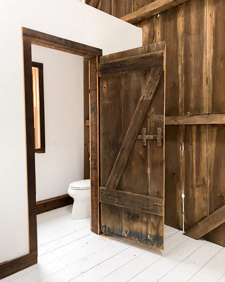 Our bathroom door where it was originally in the old barn.