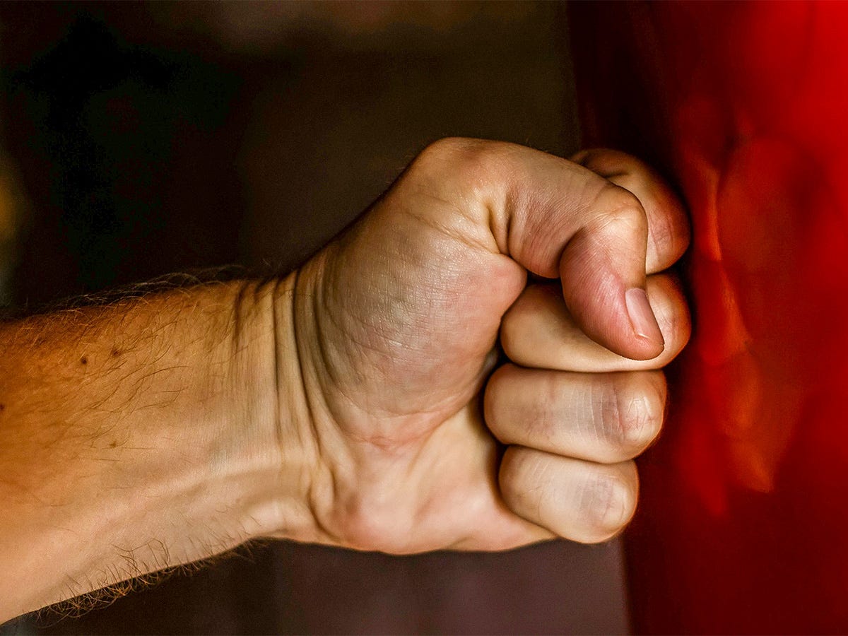 Fist Hitting the Wall