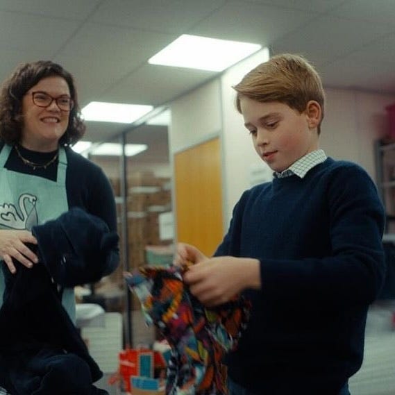 Prince George holding a fabric cloth Prince George holding a fabric cloth