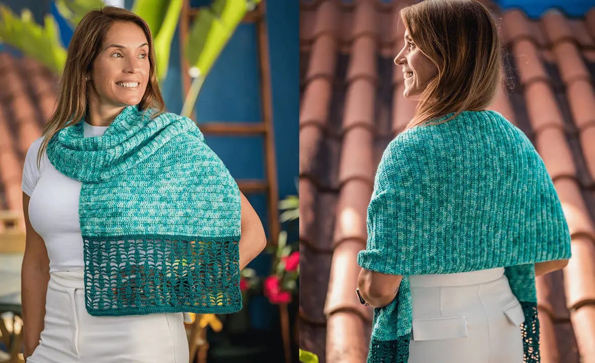 woman wearing white clothes and teal crochet shawl.