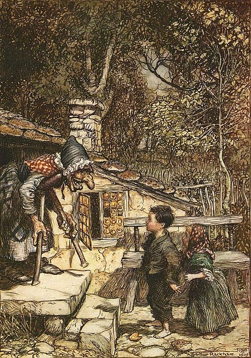 Hansel and Gretel with witch outside gingerbread cottage.