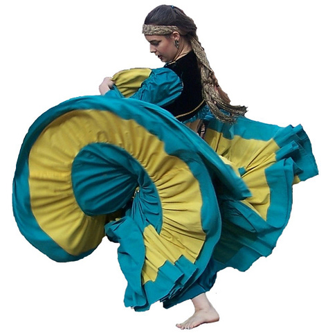 Immense skirts whorl, ripple, and pop in turquoise and yellow, and red with a five-tier hem.