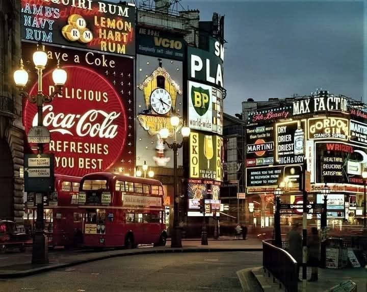 May be an image of Times Square and text that says "R AMB'S I RUM NAVY LEMON ·0者面話 MENHIN 期場格 RUM HART RUM a Coke ave SỰ PLA BP PELICIOUS ocaCola REFRESHES TRAFALCAR YOUBEST YOU BEST MAX FACTOR mort DRY DRIER MARTINI MAR DRIEST STANDS SUPEIS orld-mide រត L EHE 美樂利 S K 0 LAGER ans RIAACO MRNCS 10 DEST HEALTHFE HEAL DELICIOUS SATISFYI moлoB"