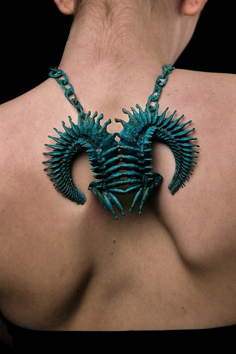 The In Trace of Every Vestige earcuff, the Broken Eggshell necklace and theIn Trace of Every Vestige necklace, by Yiran Li