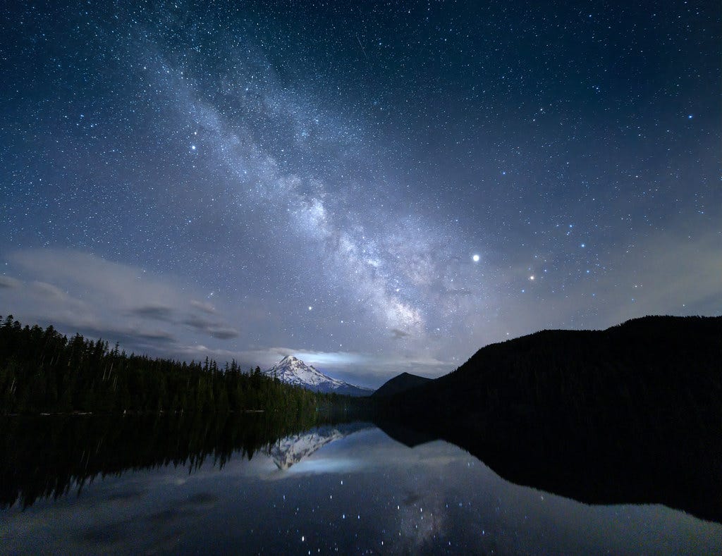 The Milky Way over Mt. Hood with stars reflected in Lost Lake, Mt. Hood National Forest, Cascade Mountains, Oregon The Milky Way over Mt. Hood with stars reflected in Lost Lake, Mt. Hood National Forest, Cascade Mountains, Oregon