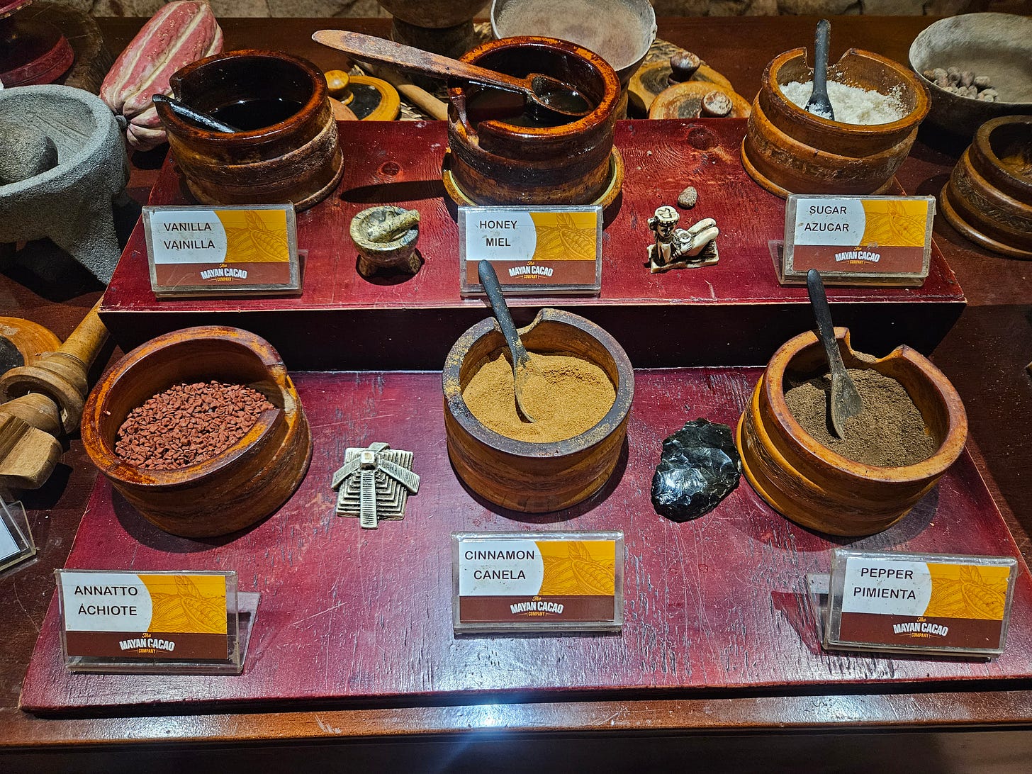 adding unique spices to the chocolate at Mayan chocolate company