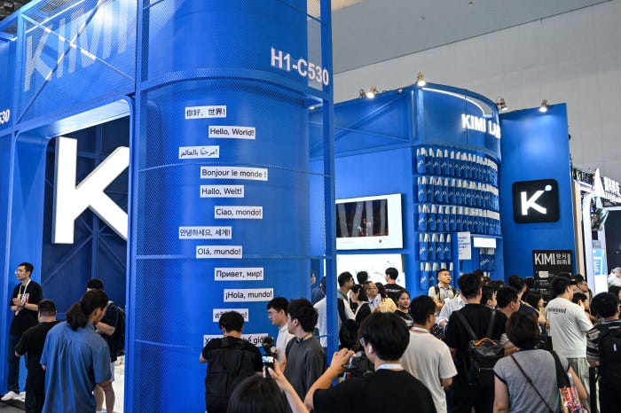Attendees at the Moonshot AI Kimi K3 stand at the World Artificial Intelligence Conference.