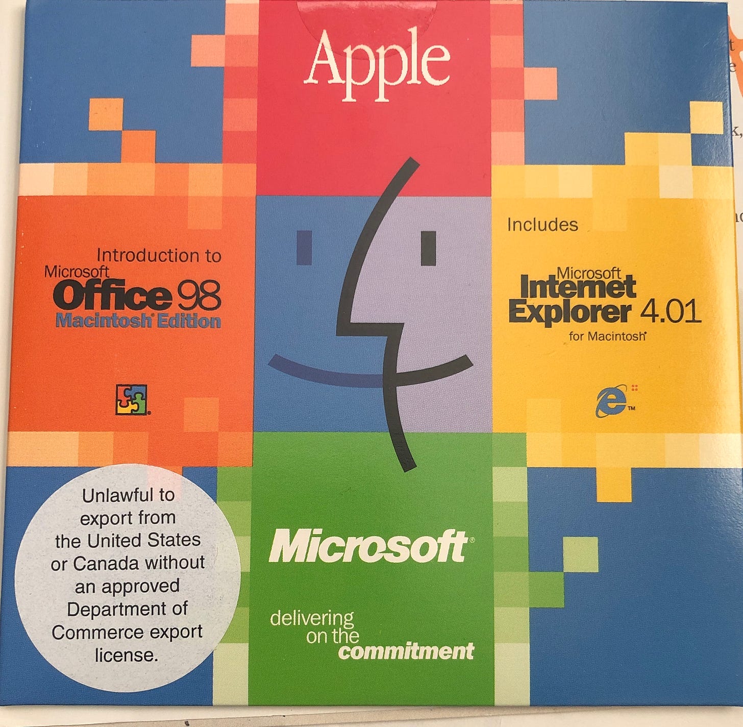 CD jacket with Apple, Mac OS, and Microsoft logos, plus a sticker with legal info about export restrictions. CD jacket with Apple, Mac OS, and Microsoft logos, plus a sticker with legal info about export restrictions.