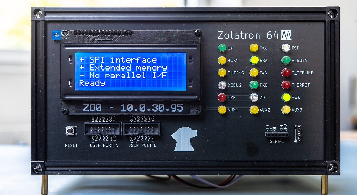Photograph of the front panel of a homemade computer showing multiple LEDs and an LCD panel.