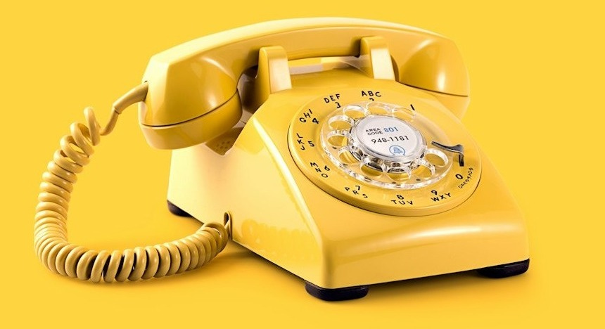 yellow rotary telephone