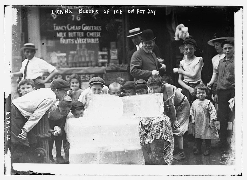 Bain News Service, Publisher. Licking Blocks of Ice on Hot Day. , ca. 1910. [Between and Ca. 1915] Photograph. https://www.loc.gov/item/2014689799/.