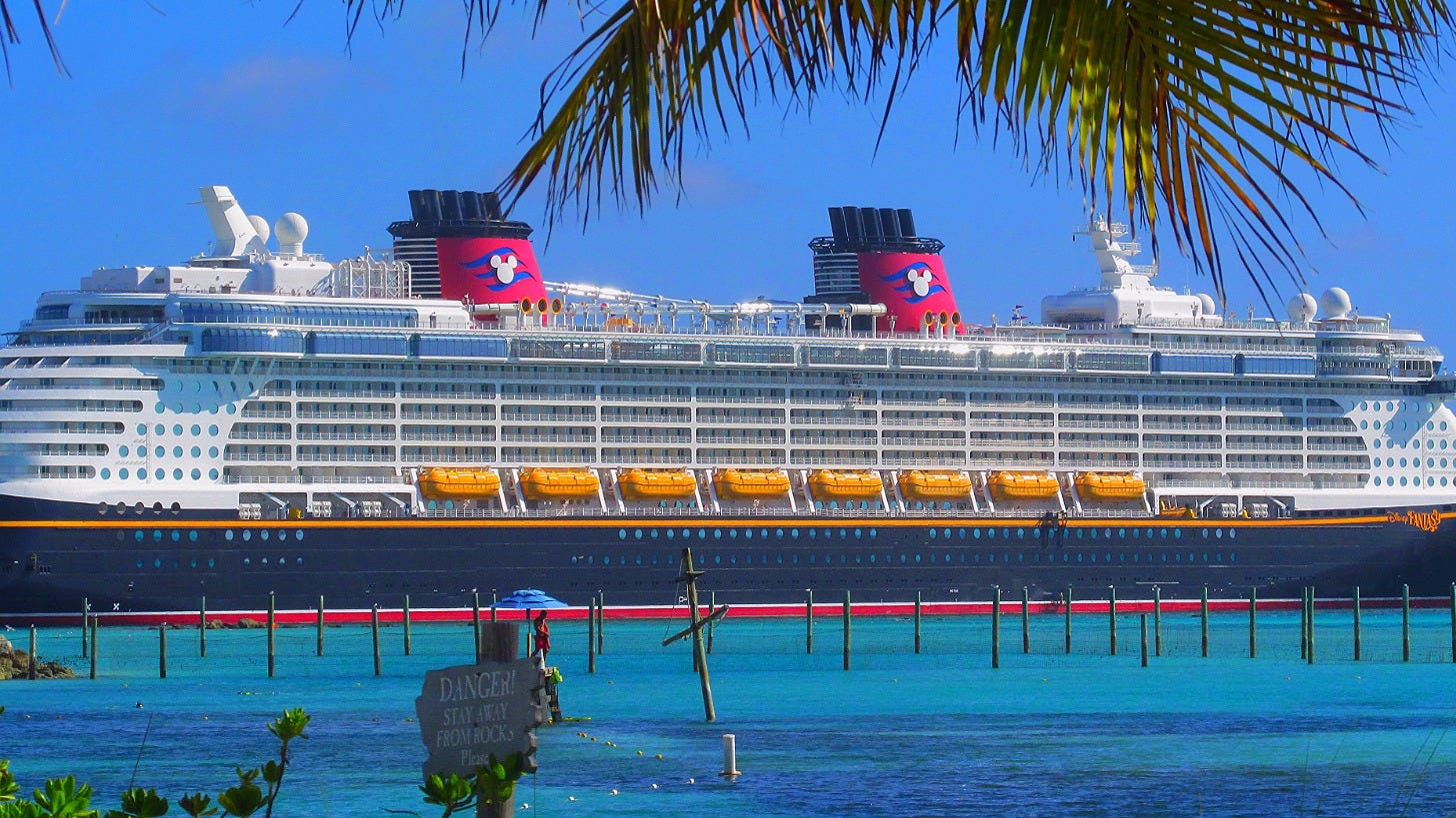 The Disney Fantasy at Castaway Cay in 2015. Pelican Plunge isn't pictured. Image: Chad Sparkes via Wikimedia Commons
