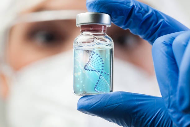 uk lab scientist biotechnologist holding glass ampoule vial with dna strand - genetic vaccine bildbanksfoton och bilder