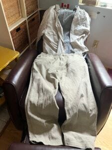 My typical daily normcore clothing ensemble. Khaki shirt word as a jacket, long sleeve pocket t-shirt, cotton elastic waist draw strong pants. All 100% cotton. None of it was made in the USA.