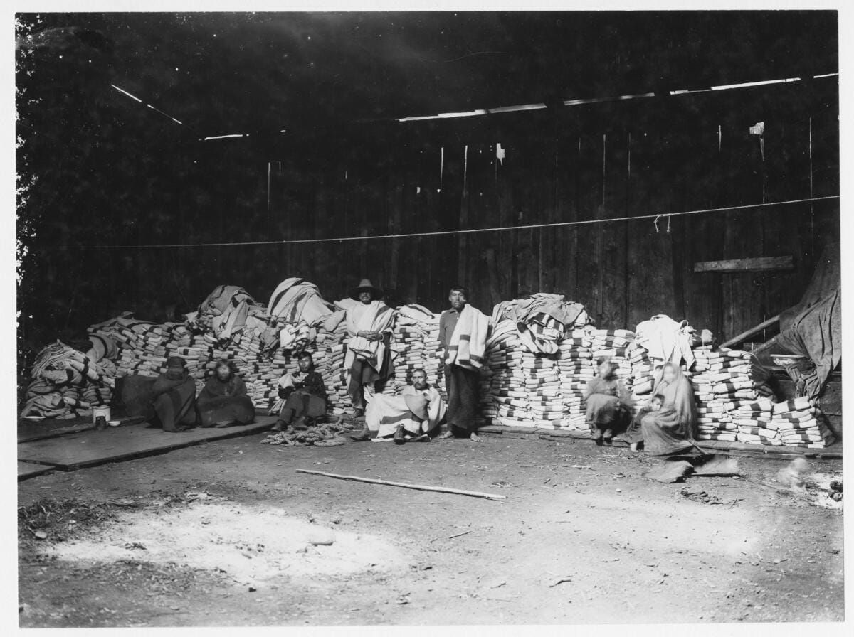 Hudson Bay Company's blankets for a Kwakiutl Potlatch in Port Rupert Hudson Bay Company's blankets for a Kwakiutl Potlatch in Port Rupert