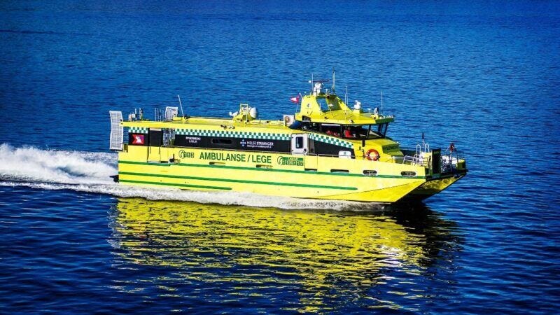 An ambulance vessel travels across the water. An ambulance vessel travels across the water.
