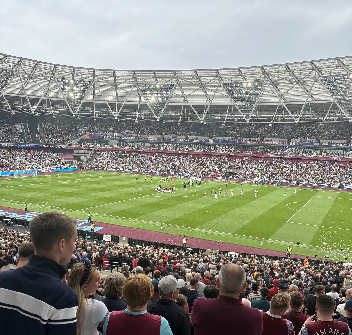 football stadium with thousands of fans in