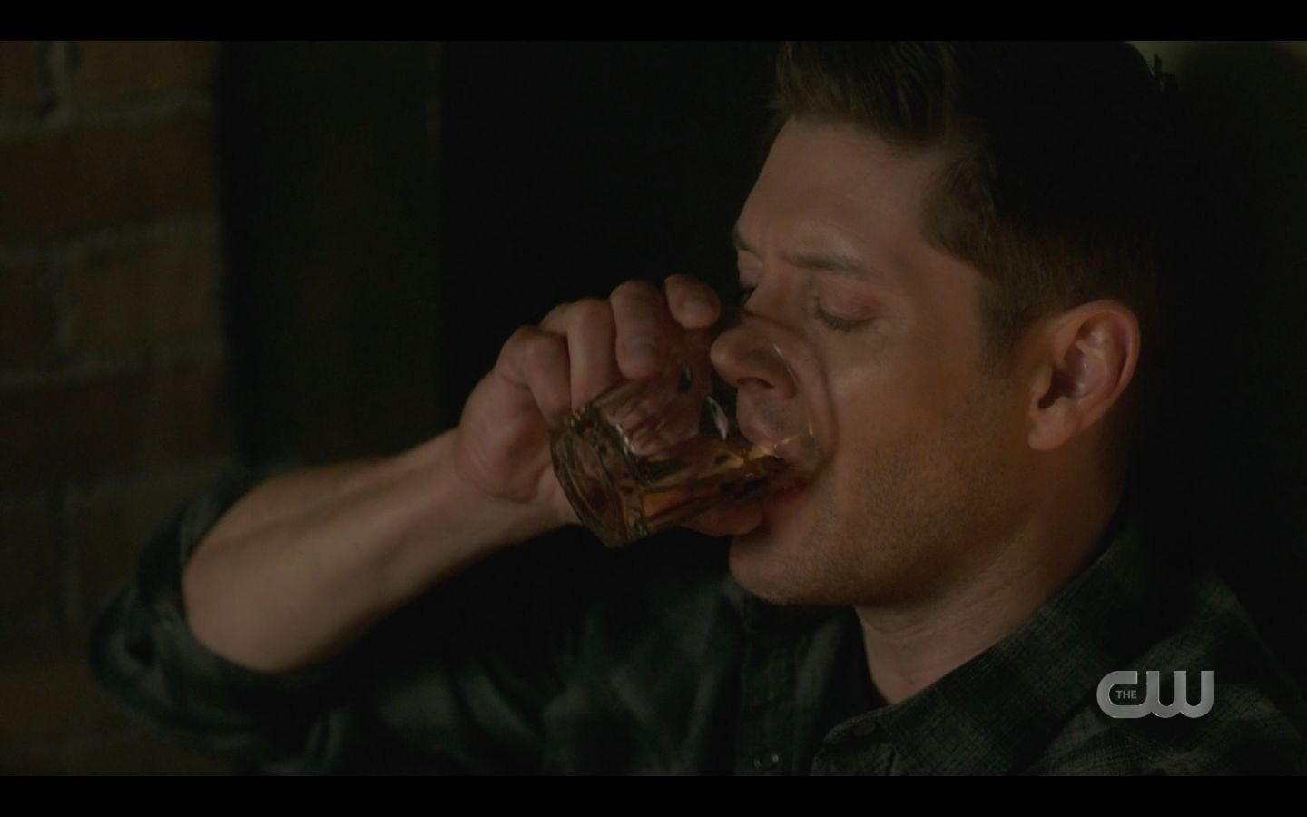 Dean Winchester taking a big slug of drink SPN 14 finale Dean Winchester taking a big slug of drink SPN 14 finale