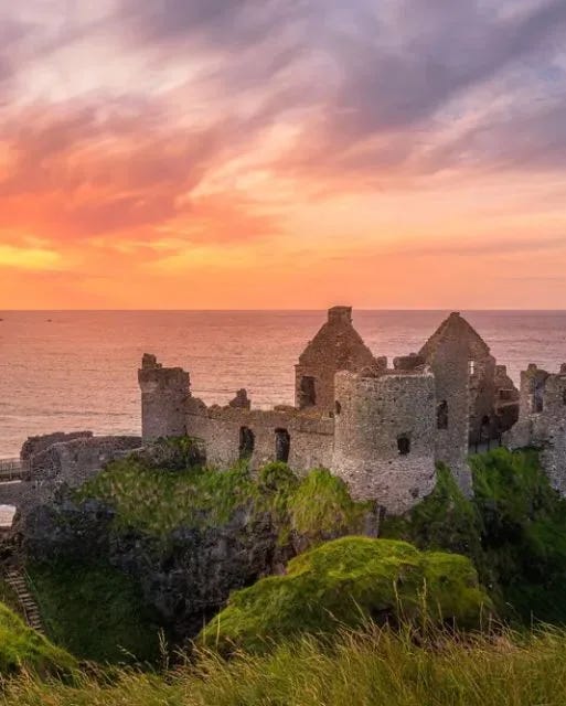 Sunset at ruins of Dunluce Castle located on the edge of cliff, Bushmills, Northern Ireland. Filming location of popular TV show Game of Thrones - Shutterstock Sunset at ruins of Dunluce Castle located on the edge of cliff, Bushmills, Northern Ireland. Filming location of popular TV show Game of Thrones - Shutterstock