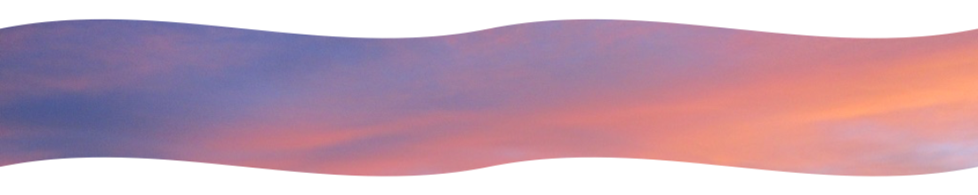 a different slice of the same sunset sky. blue with lavender and pink clouds.