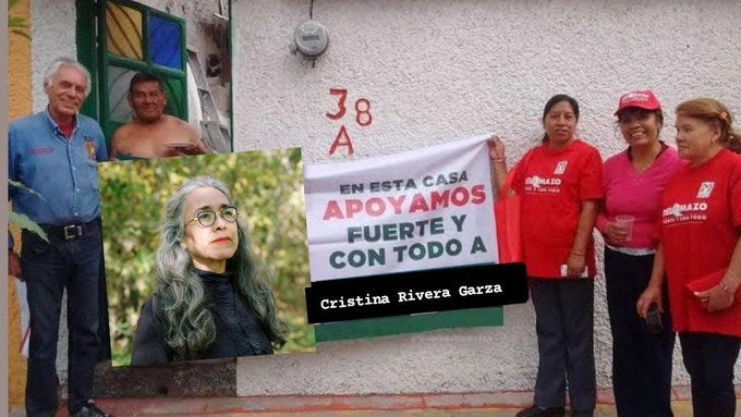 A group of people standing in front of a building with the number 38A on the wall. They hold a banner reading "EN ESTA CASA APOYAMOS APURTE Y CON TODO A CRISTINA RIVERA GARZA." Cristina Rivera Garza is visible in a photo inset, with long gray hair and glasses. Several individuals wear red shirts with text.