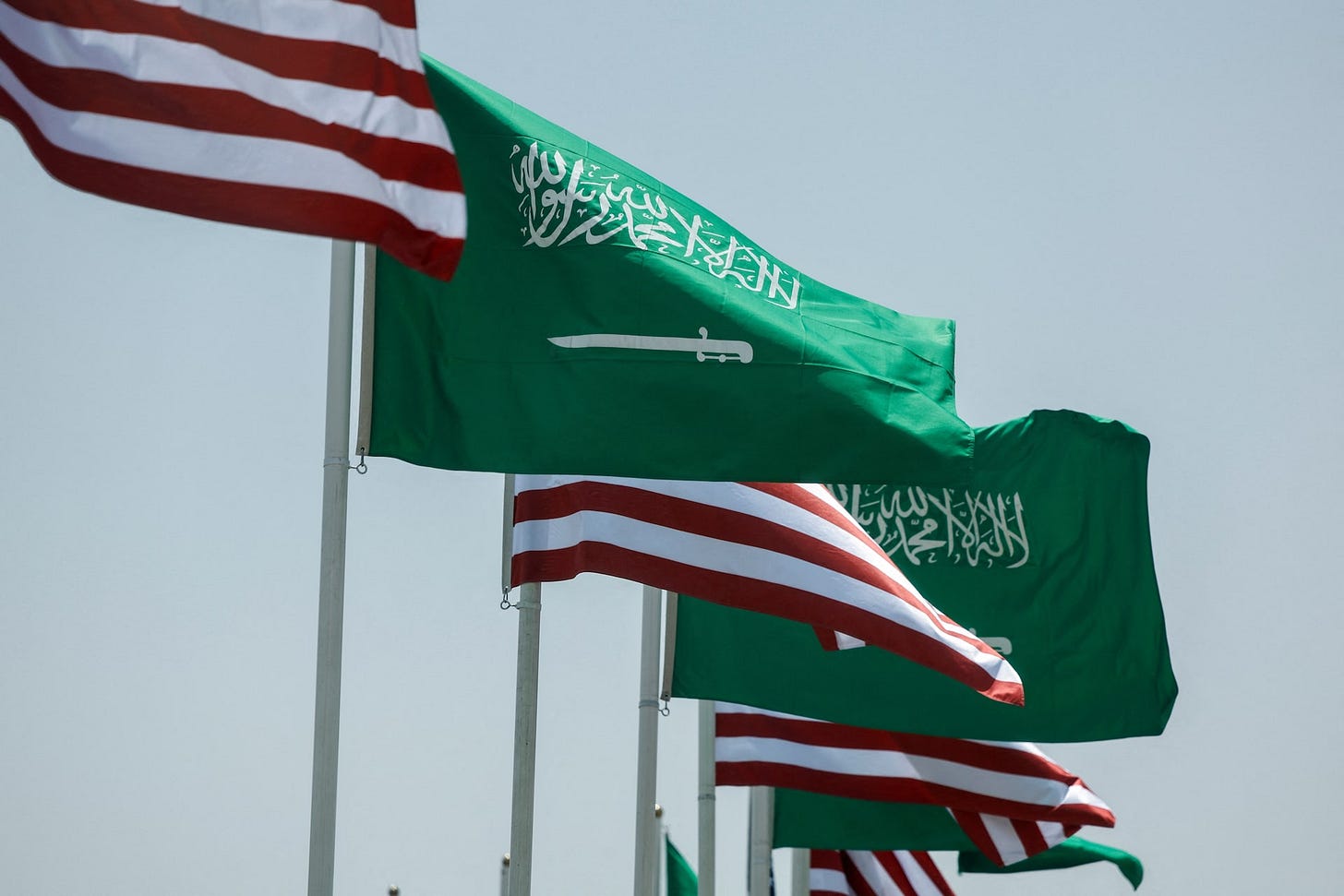 U.S. and Saudi flags flutter along a highway of Riyadh ahead of the arrival of U.S. President Donald Trump to Riyadh, Saudi Arabia U.S. and Saudi flags flutter along a highway of Riyadh ahead of the arrival of U.S. President Donald Trump to Riyadh, Saudi Arabia