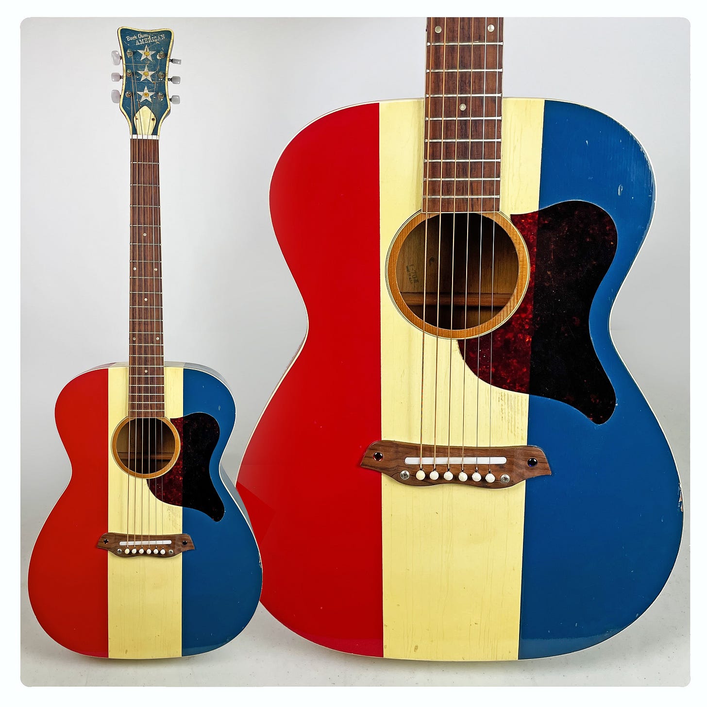 A guitar painted with red, white, and blue stripes.