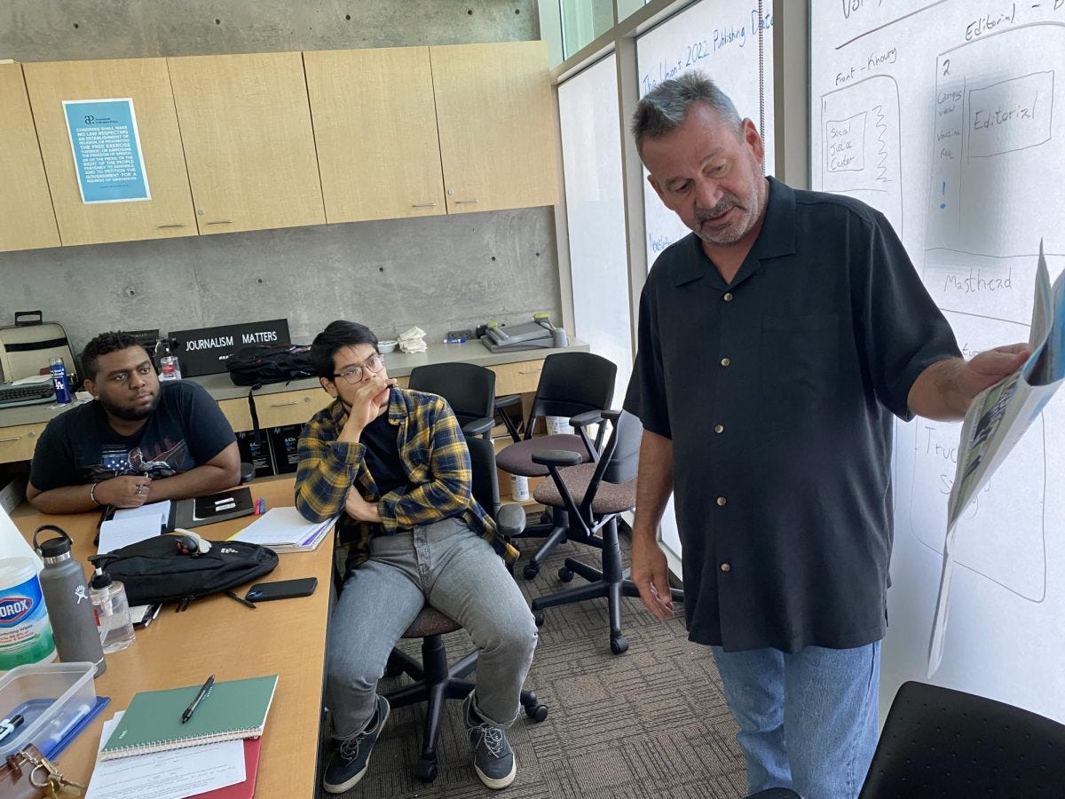 Chuck Bennett (far right) leads a photojournalism class in the El Camino College newsroom during the fall semester Oct. 3, 2022. (Photo courtesy of Stefanie Frith)