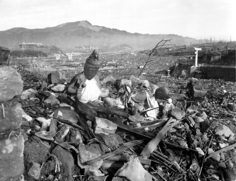 statue in the wreckage of Hiroshima