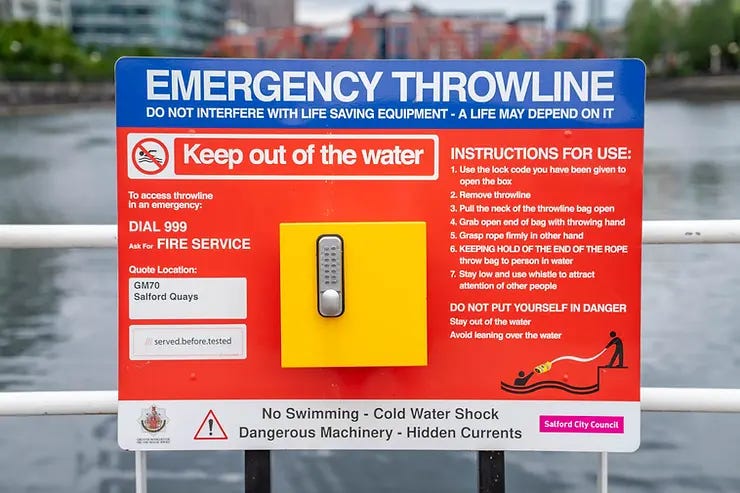 Emergency Throwline signage at Salford Quays. Emergency Throwline signage at Salford Quays.