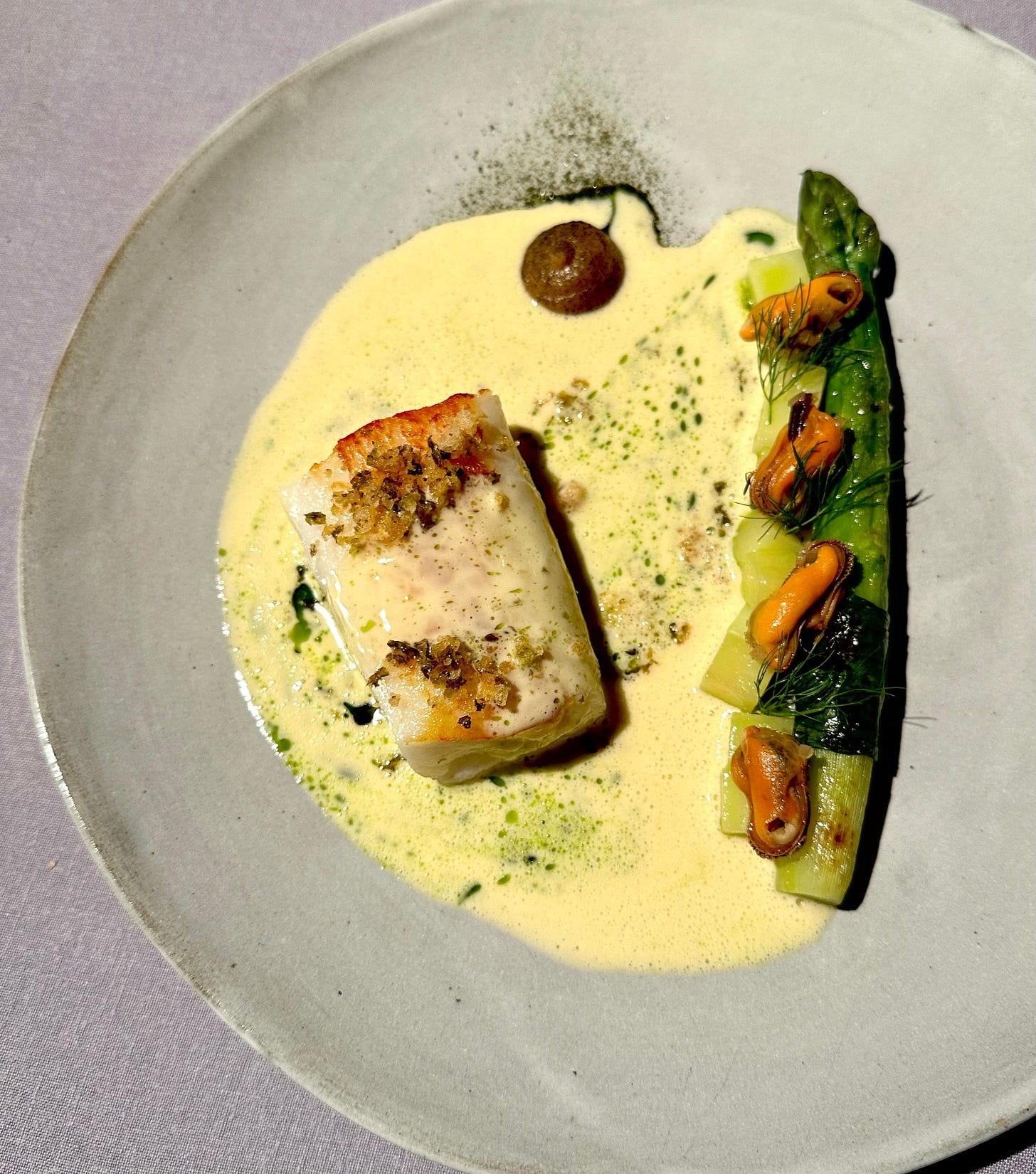 Gregans: Roast cod with BBQ leek, crispy ‘scraps’, pickled mussels, confit potato and mussel sauce