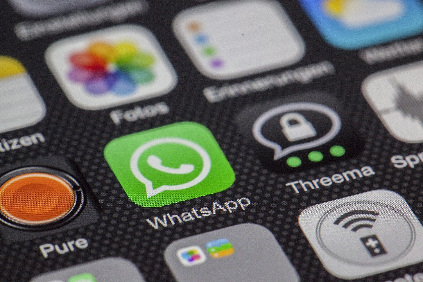 Iphone screen showing apps such as whatsapp and Threema Iphone screen showing apps such as whatsapp and Threema