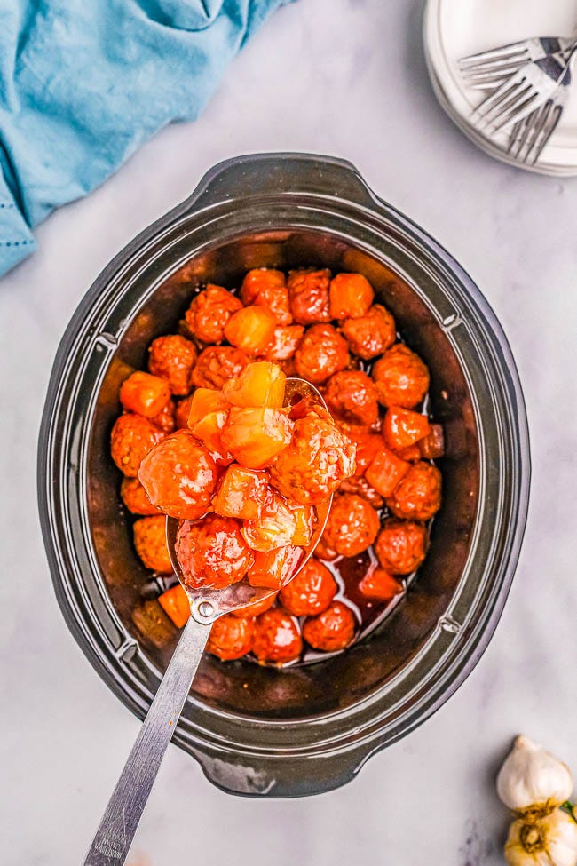 Slow Cooker Hawaiian Meatballs โ The EASIEST meatball recipe thatโs sure to be a hit at parties and events! Or turn this into a no-fuss weeknight meal and serve these pineapple-infused Hawaiian meatballs over rice! Made with only 6 ingredients so you can just set your slow cooker and let it do all the work! Slow Cooker Hawaiian Meatballs โ The EASIEST meatball recipe thatโs sure to be a hit at parties and events! Or turn this into a no-fuss weeknight meal and serve these pineapple-infused Hawaiian meatballs over rice! Made with only 6 ingredients so you can just set your slow cooker and let it do all the work!